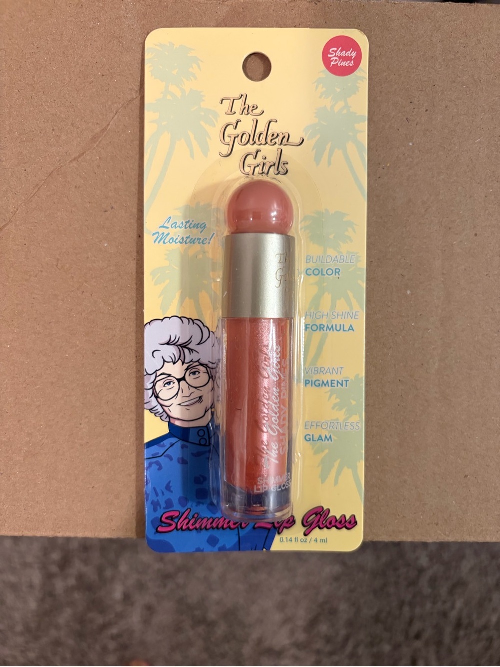 The Golden Girls Shady Pines Shimmer Lip Gloss - Peachy Coral